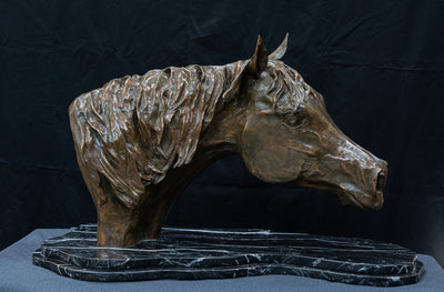 Horse head bronze sculptures